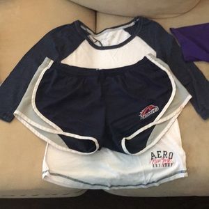 3 t- shirts, 1 pair of nike shorts, & white jeans